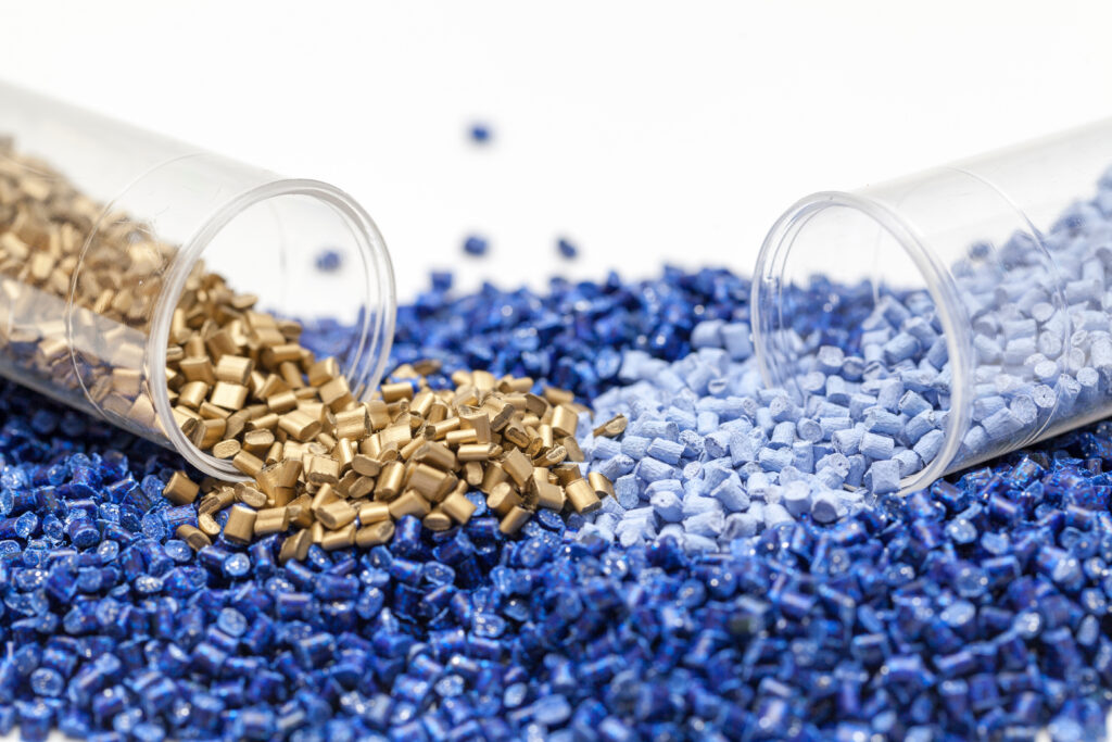 gold and blue plastic pellets