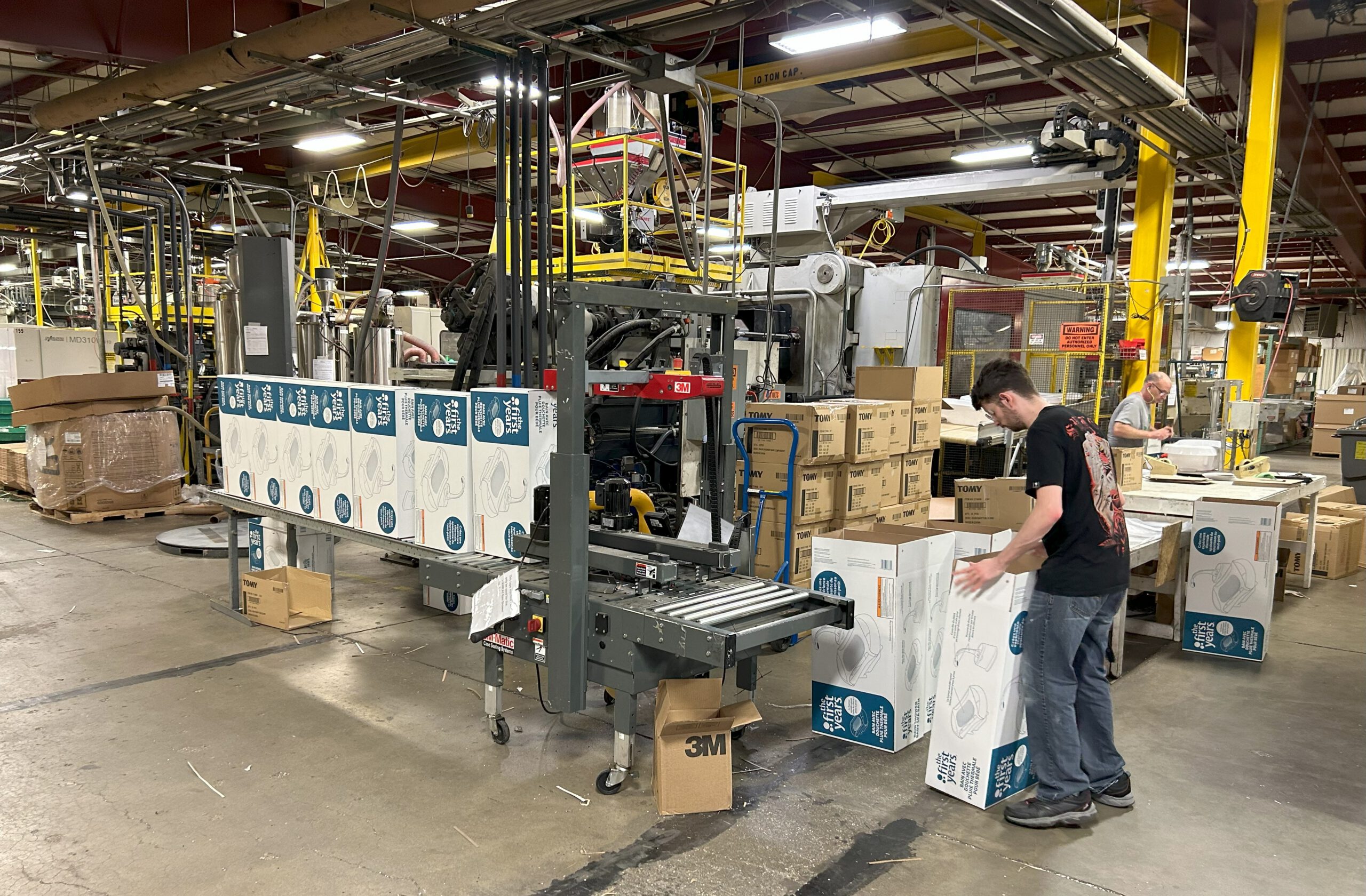 assembly workers on factory floor
